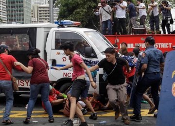 Television footage showed the van repeatedly ramming the protesters as it drove wildly back and forth after protesters had surrounded and started hitting the van.