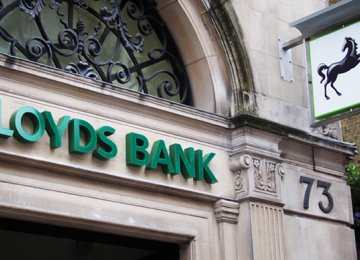 Lloyds Profits Dive