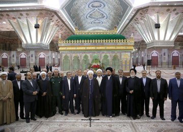 President Hassan Rouhani and his Cabinet pay tribute to the late Imam Khomeini at his mausoleum in southern Tehran on Aug. 23.  