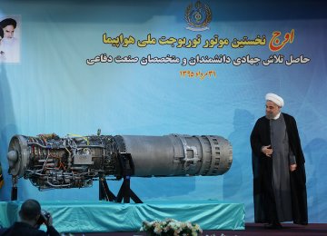 President Hassan Rouhani attends the ceremony to unveil the Owj turbojet in Tehran on Aug. 21.  