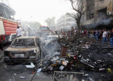 91 Killed, Scores Wounded in 2 Baghdad Bombings