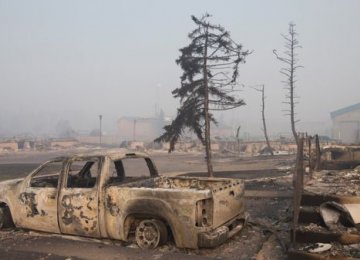 Canadian Wildfire Disrupts Evacuation 