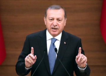 Erdogan Warns on Armenian Genocide Vote