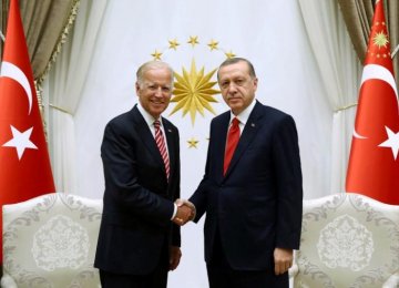 Turkish President Recep Tayyip Erdogan (R) meets with US Vice President Joe Biden at the Presidential Palace in Ankara, Turkey. 