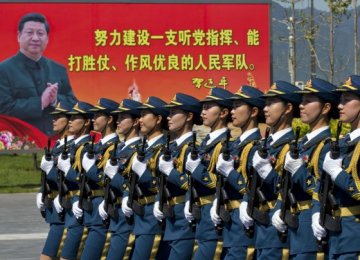 China Boosting Military Presence After Island-Building Spree