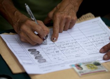 Venezuela to Confirm Recall Voters’ IDs