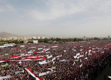 People rally to show support to a political council formed by the Houthi movement and the General People’s Congress party to unilaterally rule Yemen by both groups, in the capital Sana’a on Aug. 20.