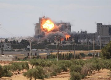 US-Led Airstrikes Kill 21 Civilians in Syria