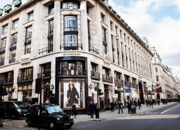 Warm weather boosted clothes sales and the pound’s plunge tempted overseas buyers to splash out on luxury items such as watches and jewelry.