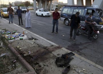 Triple Suicide Attack in Baghdad Kills 11 Troops