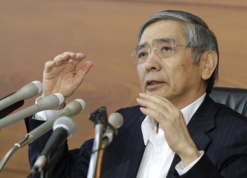 Bank of Japan Governor Haruhiko Kuroda attends a news conference at the  BoJ headquarters in Tokyo on September 21.