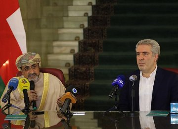 Ahmed bin Nasser Al Mahrizi (L) and Ali Asghar Mounesan met at Tehran's Sa'dabad Palace on Feb. 24.  