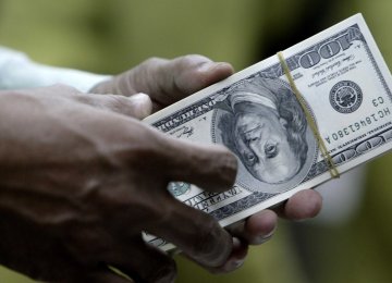 Central Bank of Iran Lets Rial Tumble    
