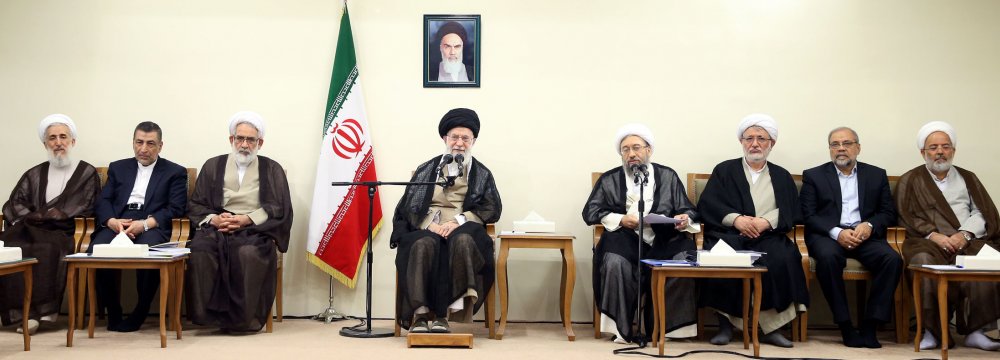 The Leader of Islamic Revolution Ayatollah Seyyed Ali Khamenei addresses the judiciary chief and officials in Tehran on Wednesday.