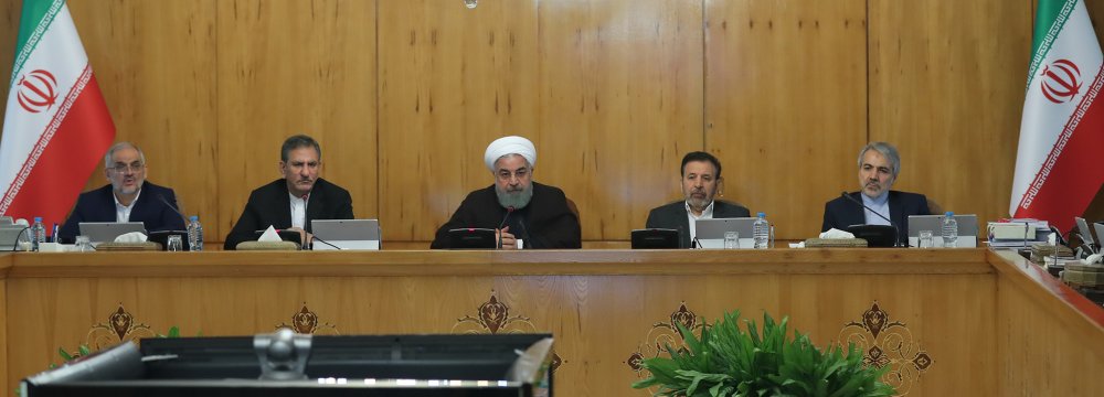 President Hassan Rouhani (C) speaks during a Cabinet meeting on March 7. 