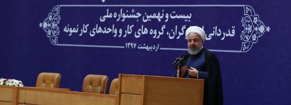 President Hassan Rouhani speaks at a ceremony in Tehran on April 29 to commemorate workers ahead of Labor Day.   