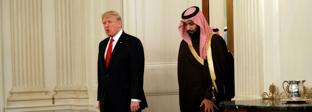 US President Donald Trump (L) and Saudi Crown Prince Mohammed bin Salman enter the State Dining Room of the White House in Washington on March 14, 2017. (File Photo)