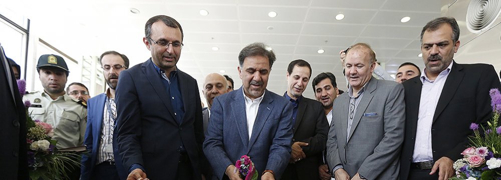 Roads and Urban Development Minister Abbas Akhoundi inaugurates airport projects in Tehran on July 26.