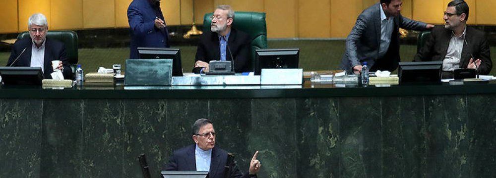 CBI Governor Valiollah Seif (Foreground) addresses the Iranian Parliament on April 10. 