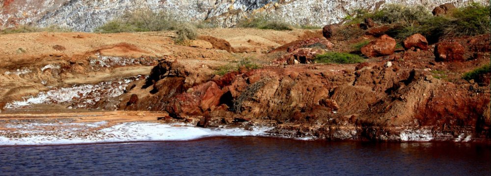 The color of soil on this small island varies from place to place and shines under the warm sun of Persian Gulf.