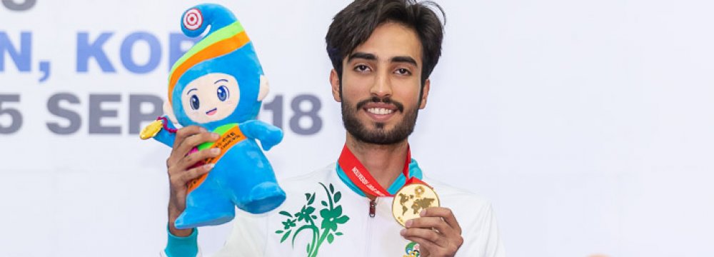 Nekounam Takes First Gold 