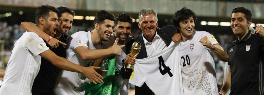 ranian national players and Carlos Queiroz celebrated entering World Cup Russia after beating Uzbekistan  in Asian qualifiers last June.