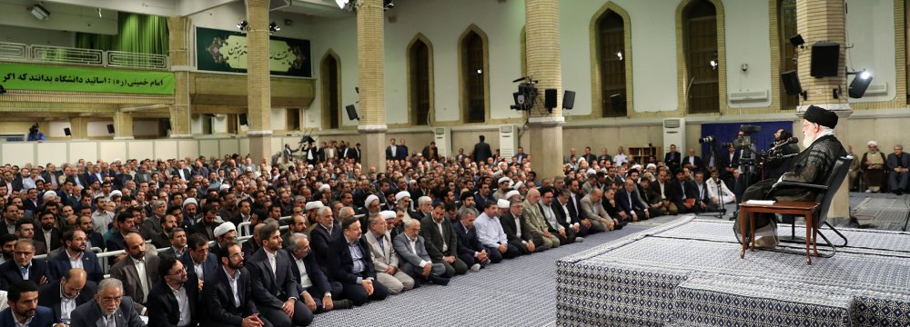 Leader of Islamic Revolution Ayatollah Seyyed Ali Khamenei addresses a group of university teachers in Tehran on Sunday.