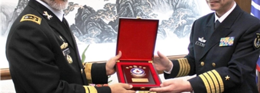 Commander Tours Chinese Naval Base