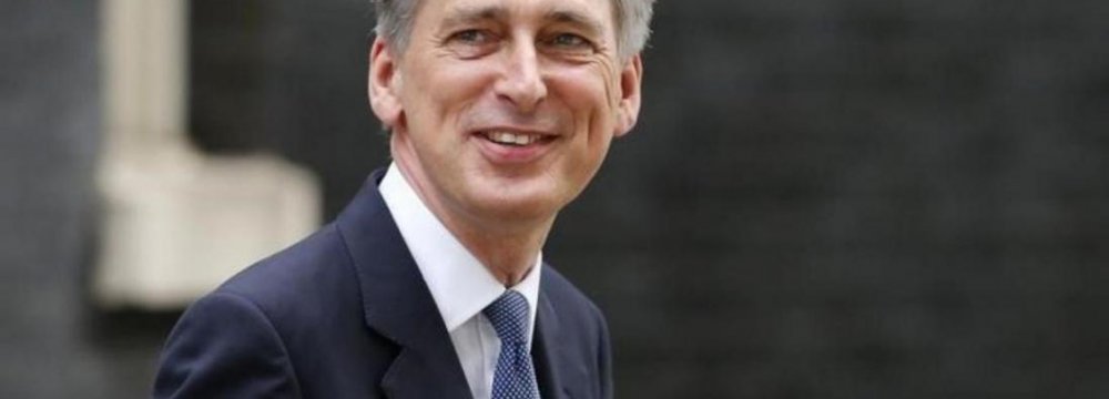 UK Urges Iran to Cooperate in Fight on IS 