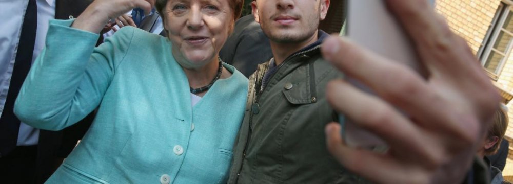 Merkel Opposes Linking Refugees With Terrorists