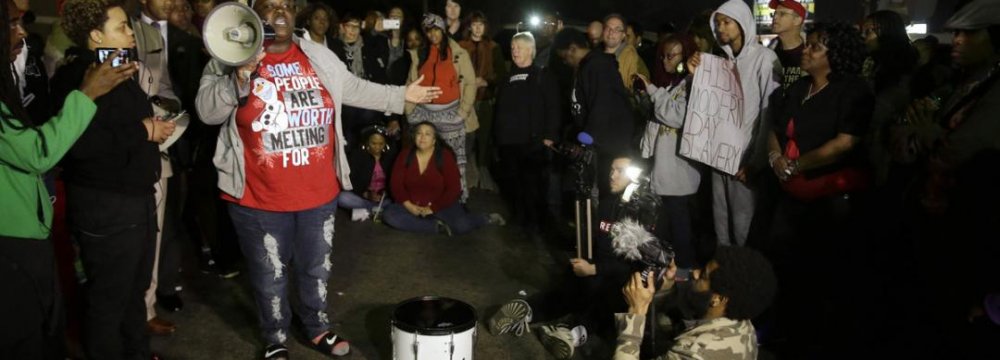 Ferguson Protesters Urge Calm After Two Policemen Injured