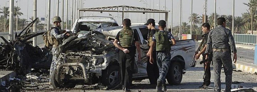Dozens Killed in Iraq Attacks