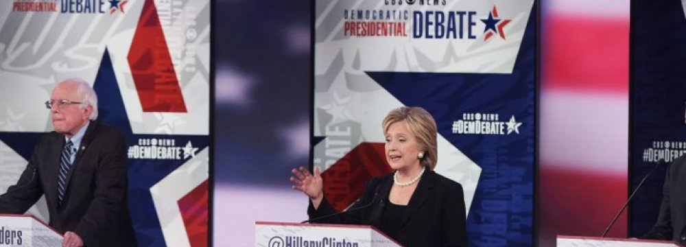 Clinton Attacked Over Iraq War in Democratic Debate