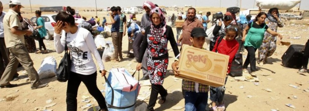 Hundreds of Syrian Christians Flee IS