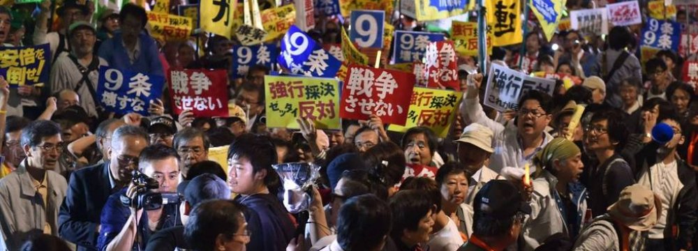 Opponents Vow to Fight  Japan’s Rising Military Role