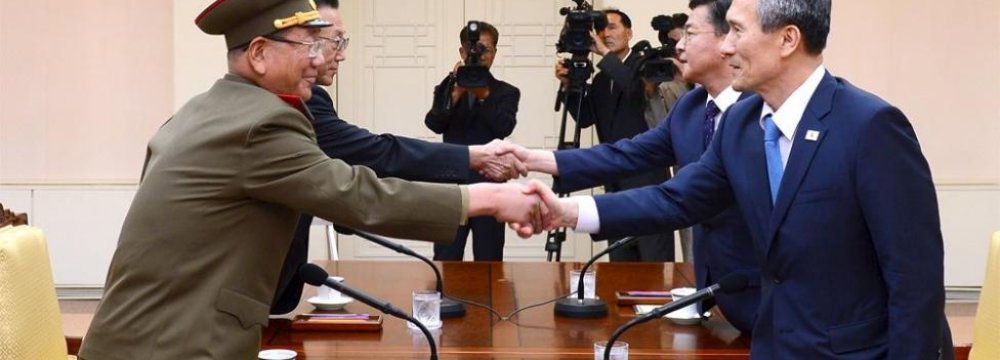 Koreas Agree Deal to Ease Tensions
