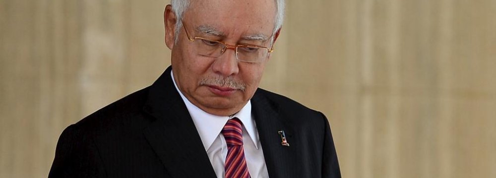 Malaysia Opposition Party Files Suit Against PM