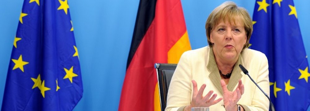 Merkel Defends Refugee  Policy Amid Discontent 