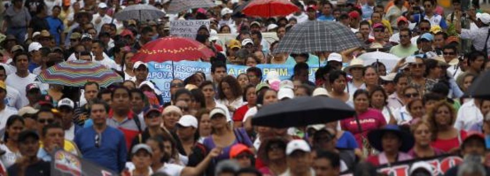 1000s March in Mexico Over Feared Student Massacre