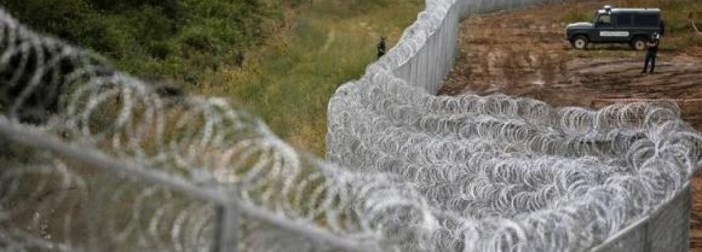 Balkan States Threaten  Border Closures Over Migrant Crisis