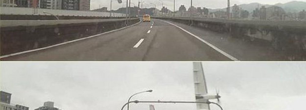 Taiwan Plane Crashes Into River