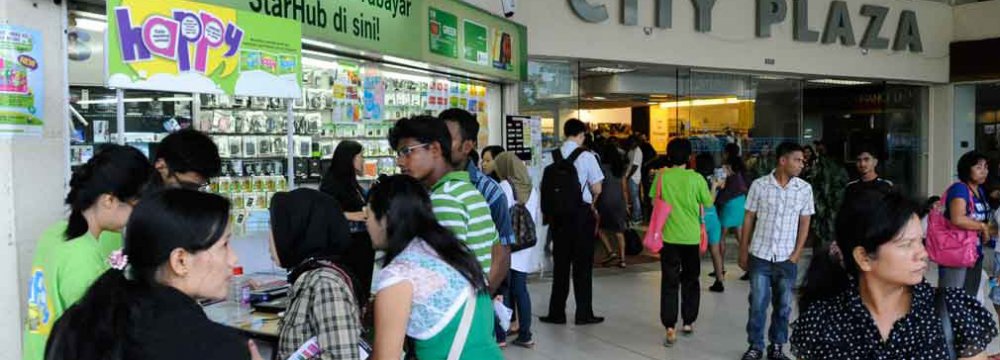IMF: Singapore Curbs on Expatriates Will Hurt Growth