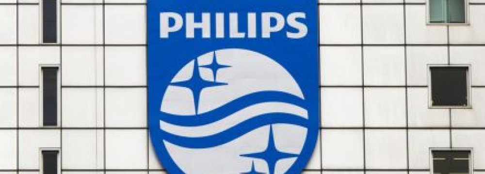 Philips Slashes Profit