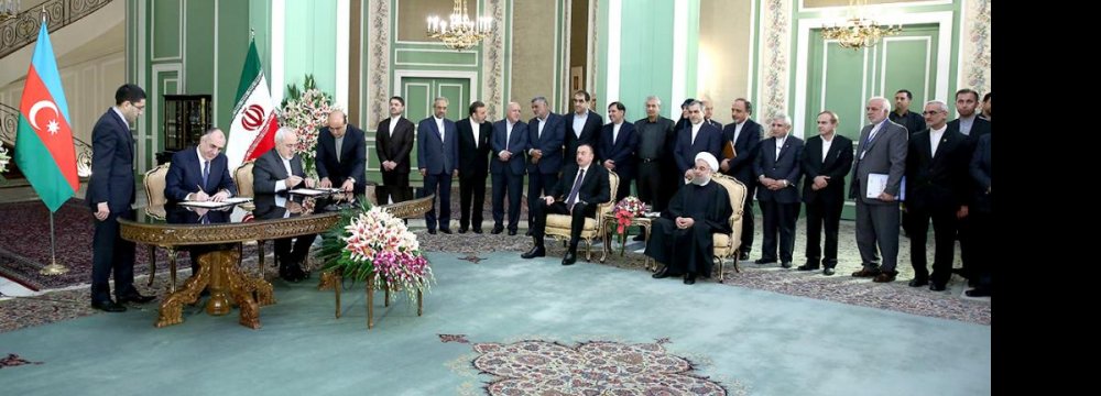 Iran, Azerbaijan Sign  11 Deals to Boost Ties