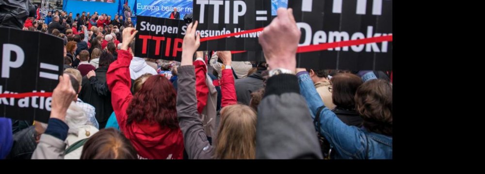 Protesters Across Europe Condemn TTIP Trade Deal 