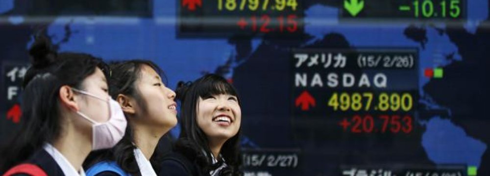 Asia, Yahoo Shares Slip, Nikkei High
