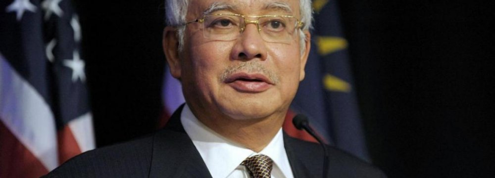 Malaysia PM Defends Development Policies