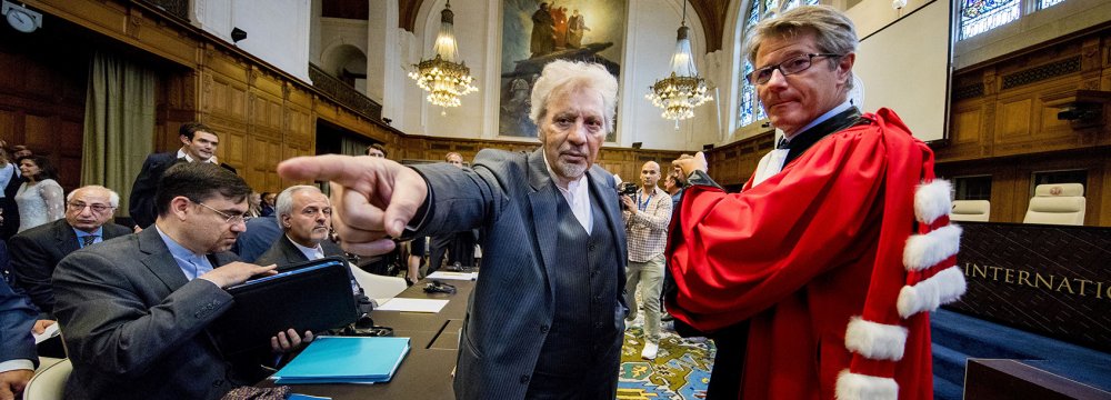 Mohsen Mohebi (L) representative of Iran is pictured during the opening of case between Iran and the United States at the The International Court of Justice (ICJ) in the Hague, August 27.
