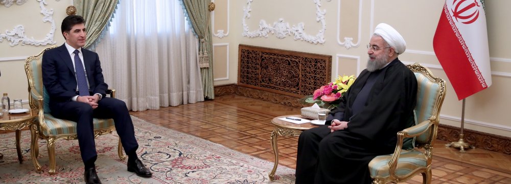 Iranian President Hassan Rouhani (R) meets with Prime Minister of Iraq's Kurdistan Regional Government Nechirvan Barzani in Tehran on Jan. 21. 