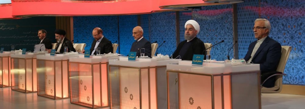 Presidential hopefuls attend a televised debate in Tehran on May 5.  